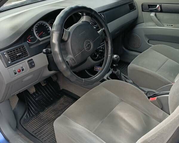 Синій Шевроле Лачетті, об'ємом двигуна 1.8 л та пробігом 298 тис. км за 4800 $, фото 7 на Automoto.ua
