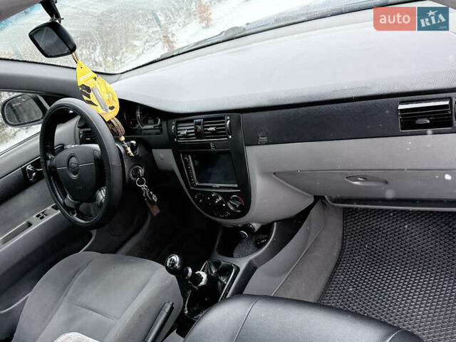 Синий Шевроле Лачетти, объемом двигателя 1.6 л и пробегом 220 тыс. км за 3500 $, фото 6 на Automoto.ua