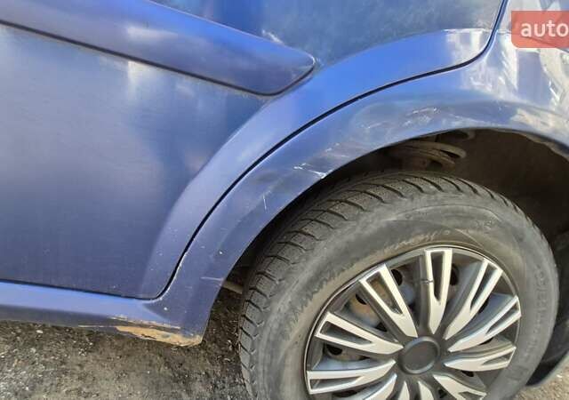 Синий Шевроле Лачетти, объемом двигателя 1.6 л и пробегом 243 тыс. км за 3800 $, фото 1 на Automoto.ua