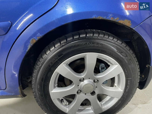Синій Шевроле Лачетті, об'ємом двигуна 1.8 л та пробігом 251 тис. км за 4200 $, фото 5 на Automoto.ua