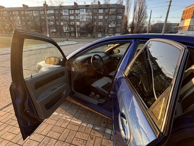 Синий Шевроле Лачетти, объемом двигателя 1.8 л и пробегом 175 тыс. км за 3950 $, фото 4 на Automoto.ua