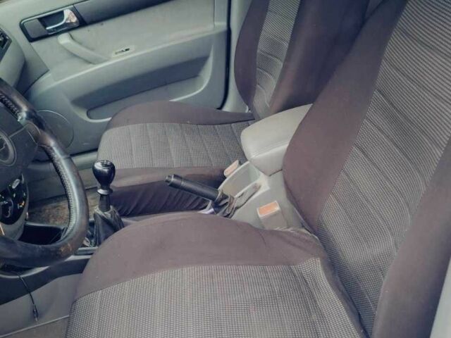 Синій Шевроле Лачетті, об'ємом двигуна 1.8 л та пробігом 247 тис. км за 3250 $, фото 13 на Automoto.ua