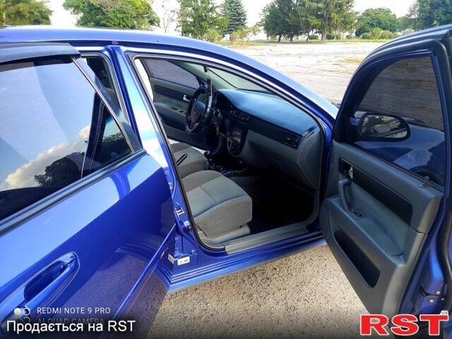 Синій Шевроле Лачетті, об'ємом двигуна 1.8 л та пробігом 0 тис. км за 4000 $, фото 8 на Automoto.ua