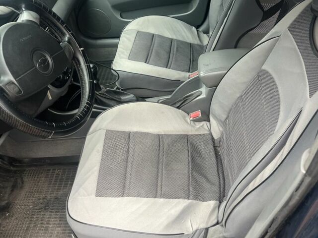 Синий Шевроле Лачетти, объемом двигателя 1.8 л и пробегом 2 тыс. км за 3600 $, фото 5 на Automoto.ua