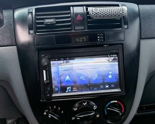 Синий Шевроле Лачетти, объемом двигателя 1.8 л и пробегом 105 тыс. км за 4500 $, фото 16 на Automoto.ua