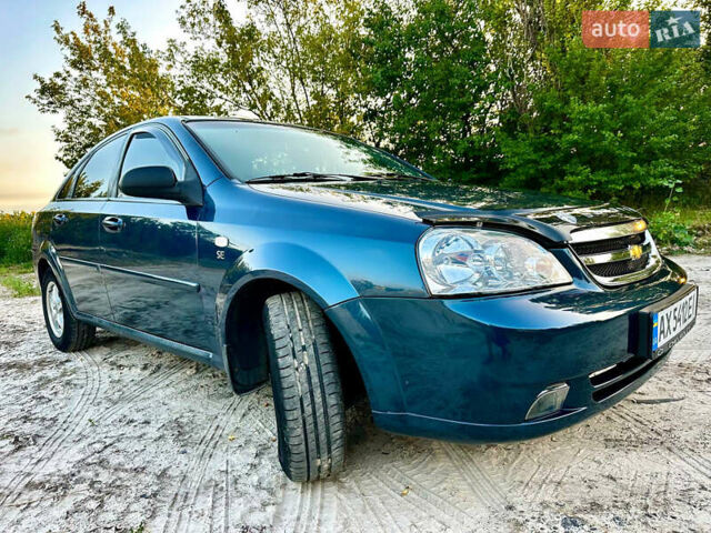 Синий Шевроле Лачетти, объемом двигателя 1.6 л и пробегом 290 тыс. км за 5000 $, фото 12 на Automoto.ua