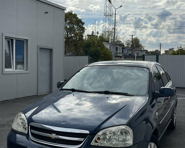 Синий Шевроле Лачетти, объемом двигателя 1.8 л и пробегом 240 тыс. км за 3699 $, фото 4 на Automoto.ua