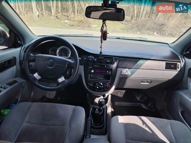 Синий Шевроле Лачетти, объемом двигателя 1.6 л и пробегом 223 тыс. км за 3800 $, фото 4 на Automoto.ua