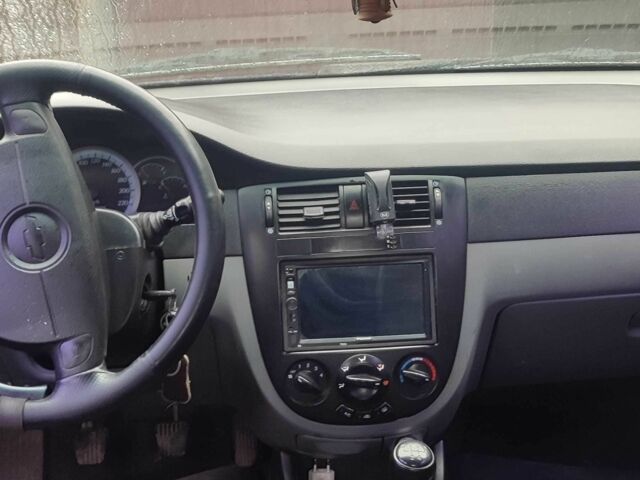 Синий Шевроле Лачетти, объемом двигателя 1.6 л и пробегом 360 тыс. км за 3700 $, фото 2 на Automoto.ua