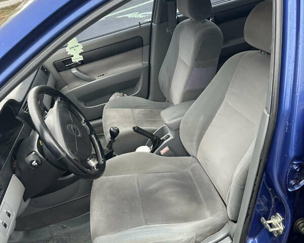 Синий Шевроле Лачетти, объемом двигателя 1.8 л и пробегом 250 тыс. км за 2850 $, фото 8 на Automoto.ua