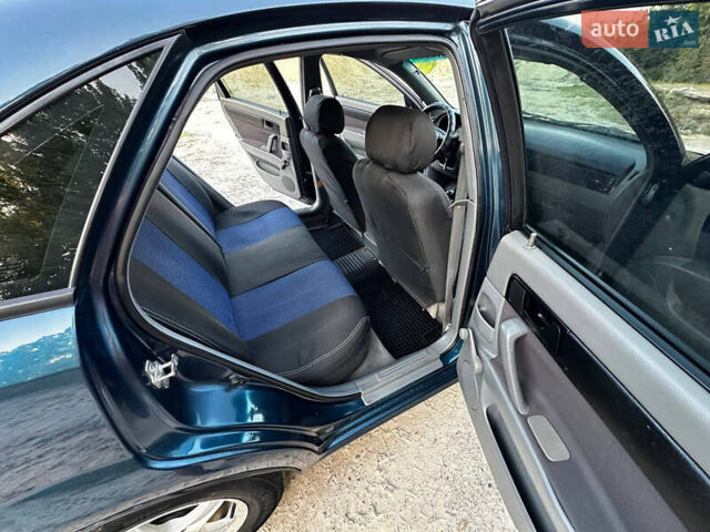 Синий Шевроле Лачетти, объемом двигателя 1.6 л и пробегом 290 тыс. км за 5000 $, фото 6 на Automoto.ua