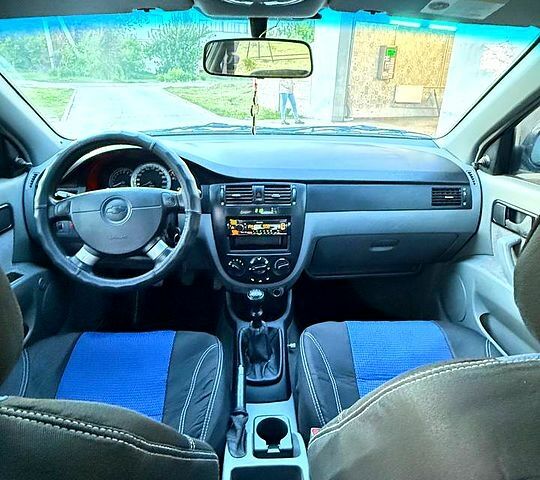 Синій Шевроле Лачетті, об'ємом двигуна 1.6 л та пробігом 185 тис. км за 4000 $, фото 4 на Automoto.ua