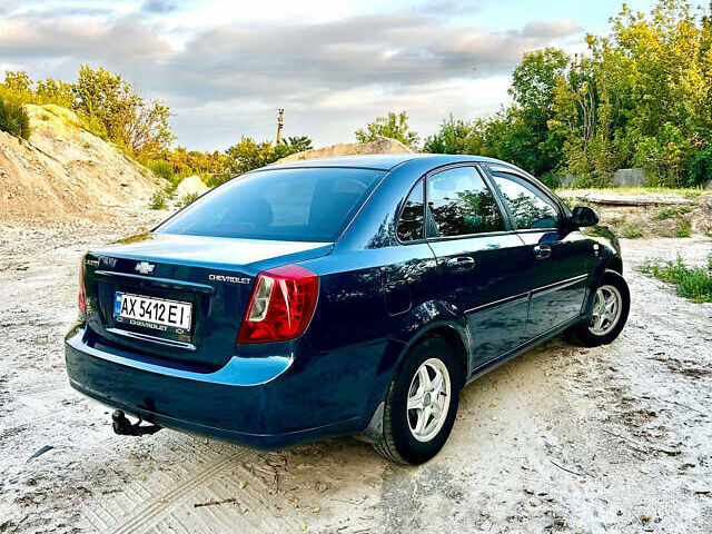 Синий Шевроле Лачетти, объемом двигателя 1.6 л и пробегом 290 тыс. км за 5000 $, фото 2 на Automoto.ua