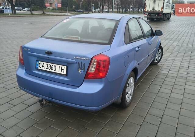 Синій Шевроле Лачетті, об'ємом двигуна 1.8 л та пробігом 170 тис. км за 5000 $, фото 2 на Automoto.ua