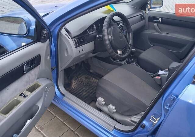Синій Шевроле Лачетті, об'ємом двигуна 1.8 л та пробігом 170 тис. км за 5000 $, фото 10 на Automoto.ua
