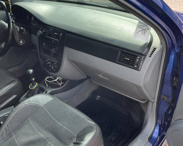 Синий Шевроле Лачетти, объемом двигателя 1.6 л и пробегом 255 тыс. км за 4200 $, фото 10 на Automoto.ua