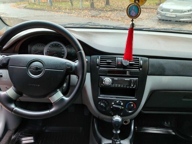 Синий Шевроле Лачетти, объемом двигателя 1.8 л и пробегом 157 тыс. км за 4400 $, фото 2 на Automoto.ua