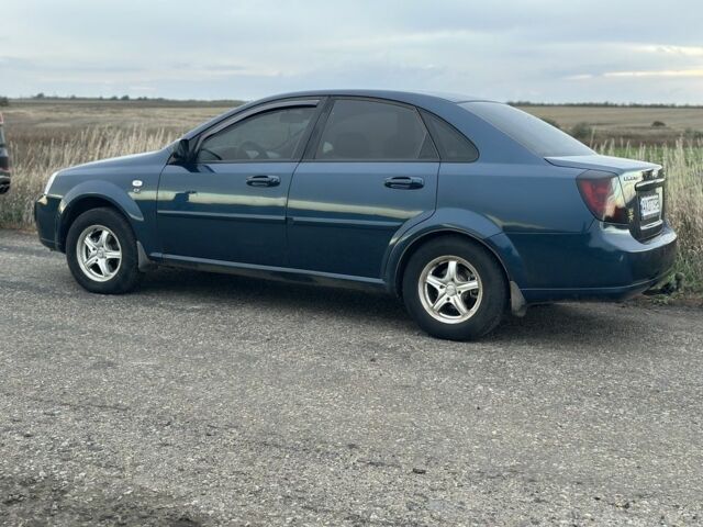 Синий Шевроле Лачетти, объемом двигателя 1.6 л и пробегом 310 тыс. км за 3403 $, фото 3 на Automoto.ua
