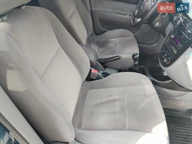 Синий Шевроле Лачетти, объемом двигателя 1.6 л и пробегом 223 тыс. км за 3800 $, фото 6 на Automoto.ua