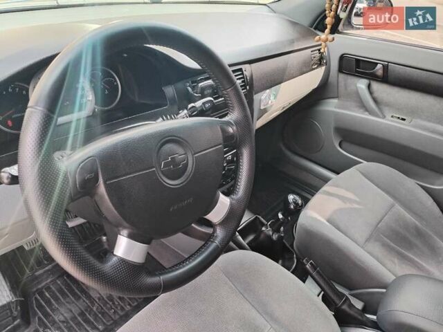 Синий Шевроле Лачетти, объемом двигателя 1.6 л и пробегом 223 тыс. км за 3800 $, фото 5 на Automoto.ua