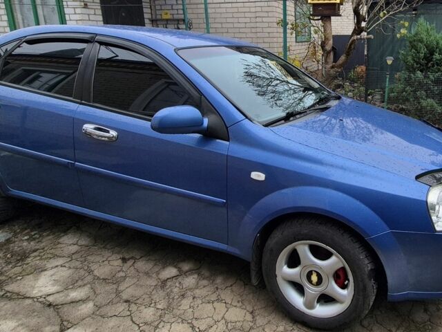 Синій Шевроле Лачетті, об'ємом двигуна 1.8 л та пробігом 223 тис. км за 4000 $, фото 2 на Automoto.ua