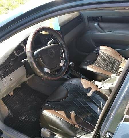 Синий Шевроле Лачетти, объемом двигателя 1.6 л и пробегом 207 тыс. км за 4300 $, фото 7 на Automoto.ua