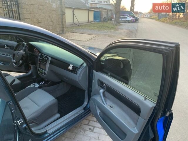 Синій Шевроле Лачетті, об'ємом двигуна 1.8 л та пробігом 255 тис. км за 4000 $, фото 10 на Automoto.ua