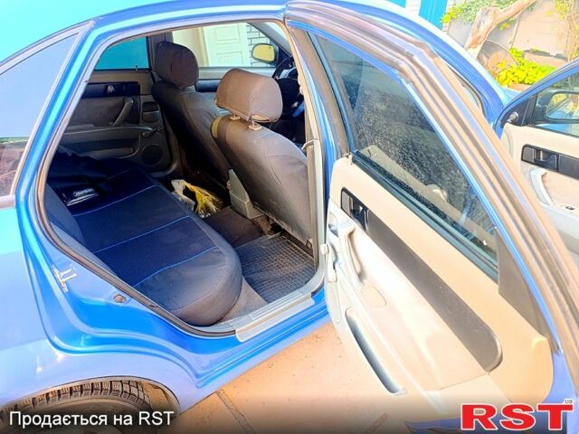 Синий Шевроле Лачетти, объемом двигателя 1.6 л и пробегом 193 тыс. км за 3400 $, фото 8 на Automoto.ua