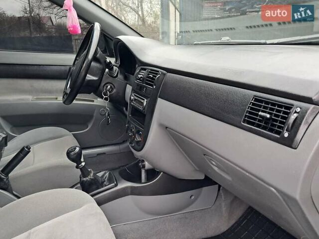 Синий Шевроле Лачетти, объемом двигателя 1.6 л и пробегом 199 тыс. км за 3849 $, фото 31 на Automoto.ua