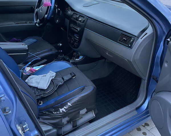 Синий Шевроле Лачетти, объемом двигателя 1.6 л и пробегом 198 тыс. км за 3300 $, фото 15 на Automoto.ua