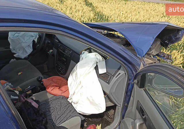 Синий Шевроле Лачетти, объемом двигателя 1.6 л и пробегом 160 тыс. км за 1190 $, фото 3 на Automoto.ua