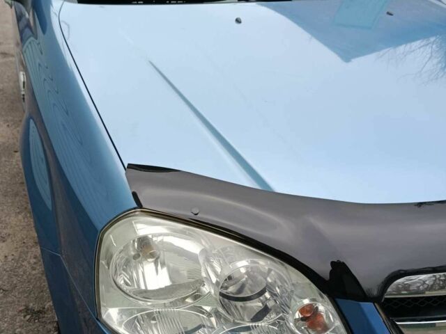 Синий Шевроле Лачетти, объемом двигателя 1.6 л и пробегом 96 тыс. км за 5450 $, фото 4 на Automoto.ua