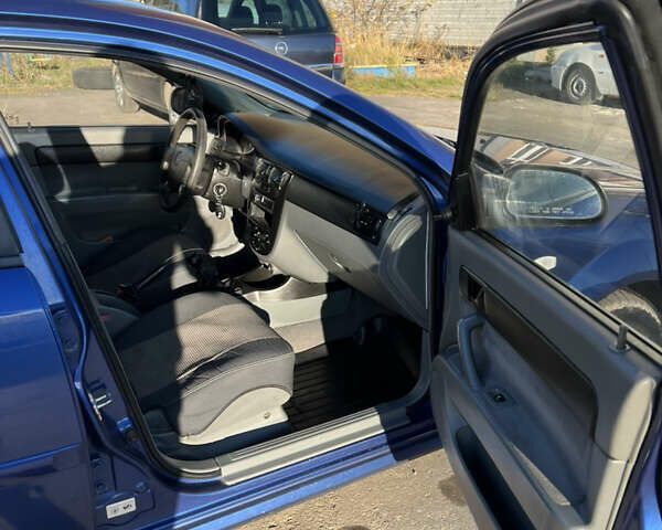 Синий Шевроле Лачетти, объемом двигателя 1.6 л и пробегом 215 тыс. км за 3499 $, фото 6 на Automoto.ua