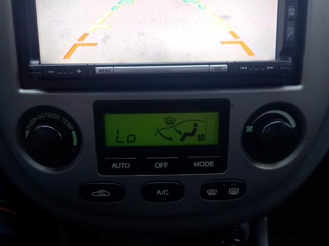 Синій Шевроле Лачетті, об'ємом двигуна 1.8 л та пробігом 290 тис. км за 4500 $, фото 4 на Automoto.ua