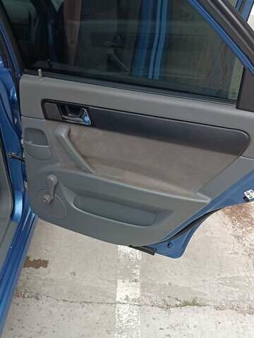 Синий Шевроле Лачетти, объемом двигателя 1.8 л и пробегом 233 тыс. км за 4700 $, фото 4 на Automoto.ua