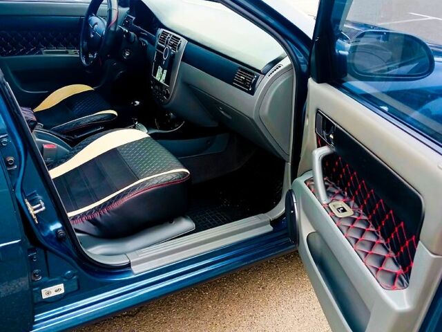 Синій Шевроле Лачетті, об'ємом двигуна 1.8 л та пробігом 260 тис. км за 5400 $, фото 5 на Automoto.ua