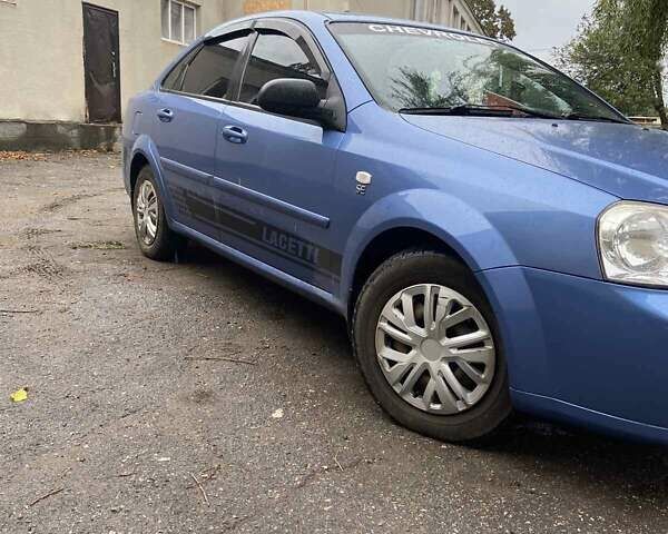 Синий Шевроле Лачетти, объемом двигателя 1.6 л и пробегом 275 тыс. км за 5000 $, фото 3 на Automoto.ua