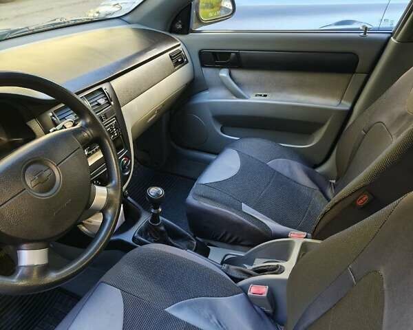 Синий Шевроле Лачетти, объемом двигателя 1.6 л и пробегом 157 тыс. км за 5000 $, фото 22 на Automoto.ua