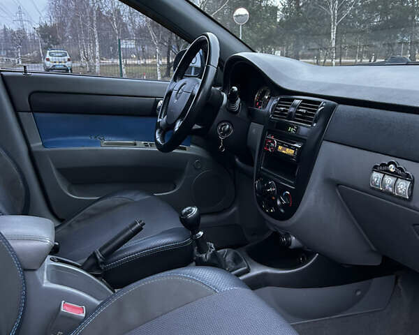 Синий Шевроле Лачетти, объемом двигателя 1.8 л и пробегом 221 тыс. км за 4650 $, фото 14 на Automoto.ua