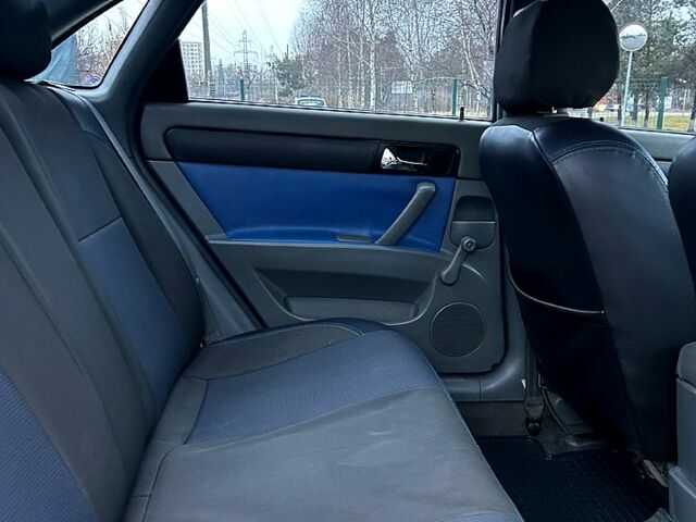 Синій Шевроле Лачетті, об'ємом двигуна 1.8 л та пробігом 221 тис. км за 4650 $, фото 12 на Automoto.ua