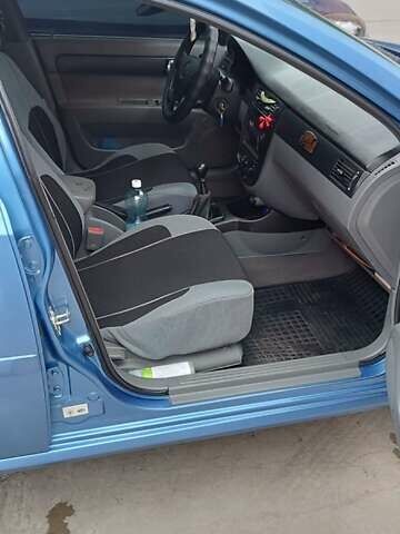 Синий Шевроле Лачетти, объемом двигателя 1.8 л и пробегом 233 тыс. км за 4700 $, фото 5 на Automoto.ua