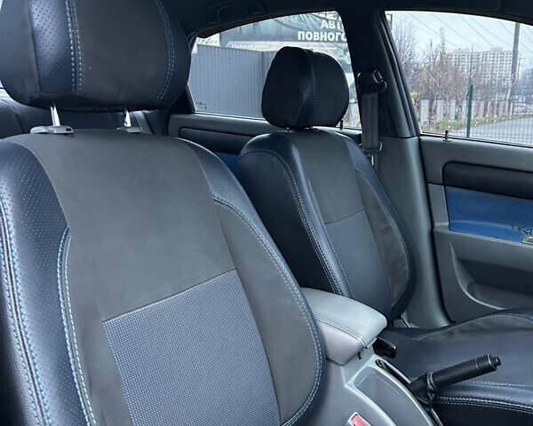 Синий Шевроле Лачетти, объемом двигателя 1.8 л и пробегом 221 тыс. км за 4650 $, фото 13 на Automoto.ua