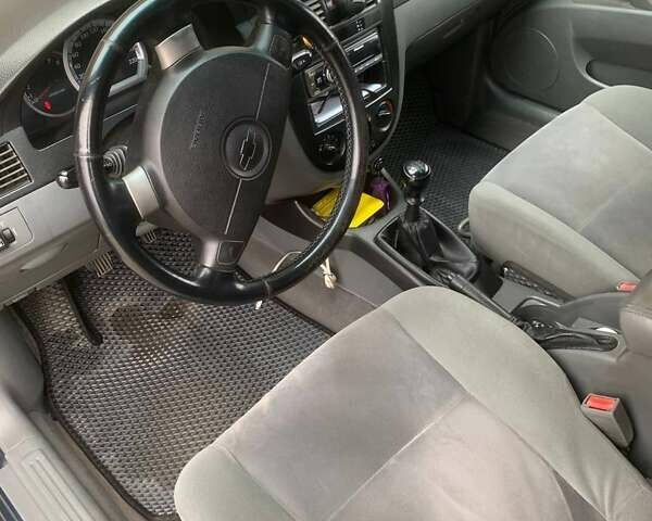 Синій Шевроле Лачетті, об'ємом двигуна 1.8 л та пробігом 335 тис. км за 4000 $, фото 7 на Automoto.ua