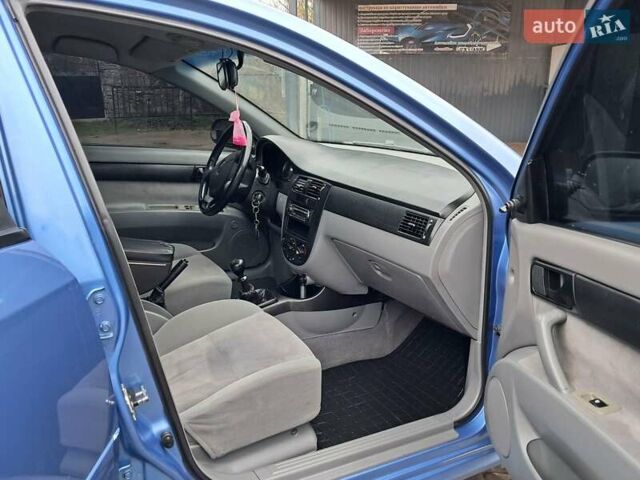 Синий Шевроле Лачетти, объемом двигателя 1.6 л и пробегом 199 тыс. км за 3849 $, фото 29 на Automoto.ua
