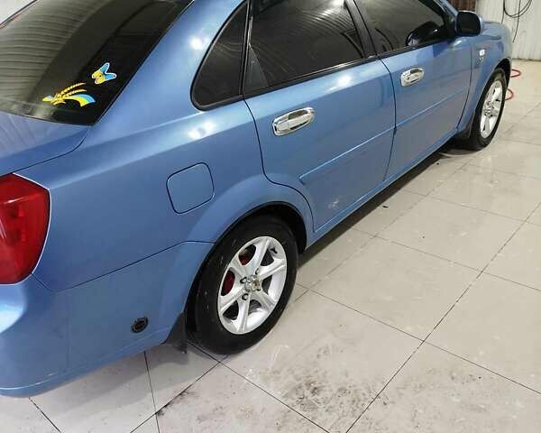 Синий Шевроле Лачетти, объемом двигателя 1.8 л и пробегом 233 тыс. км за 4700 $, фото 18 на Automoto.ua
