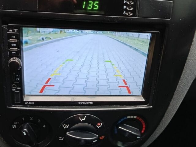 Синий Шевроле Лачетти, объемом двигателя 1.6 л и пробегом 306 тыс. км за 3553 $, фото 7 на Automoto.ua