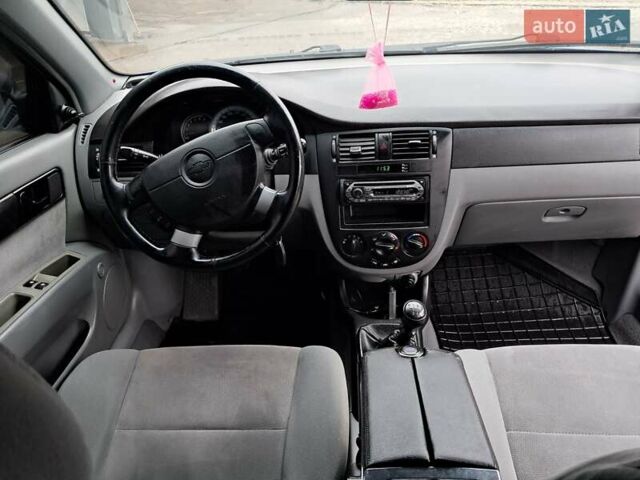 Синий Шевроле Лачетти, объемом двигателя 1.6 л и пробегом 199 тыс. км за 3849 $, фото 33 на Automoto.ua