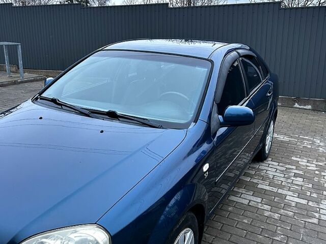 Синій Шевроле Лачетті, об'ємом двигуна 1.8 л та пробігом 221 тис. км за 4650 $, фото 2 на Automoto.ua