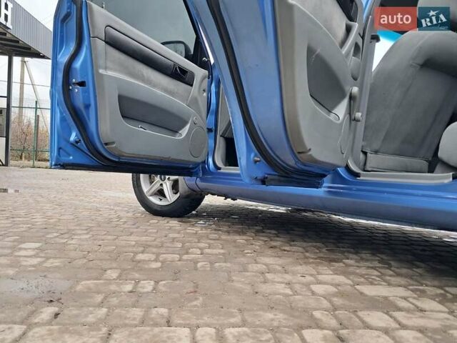 Синий Шевроле Лачетти, объемом двигателя 1.6 л и пробегом 199 тыс. км за 3849 $, фото 26 на Automoto.ua