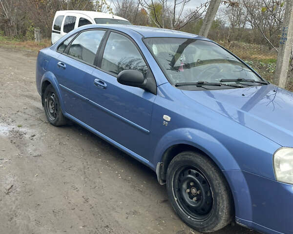 Синий Шевроле Лачетти, объемом двигателя 1.6 л и пробегом 198 тыс. км за 3300 $, фото 32 на Automoto.ua